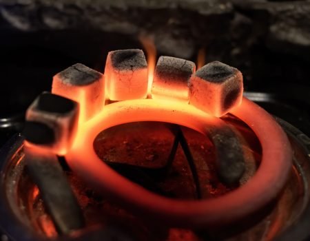 Five coals for hookah heating on the stove